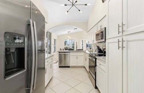 Punta Gorda House | MAGNIFICENT! LUXURY WATERFRONT HOME;BIG HEATED POOL-80’ DOCK! 5 MIN FISH VILLAGE