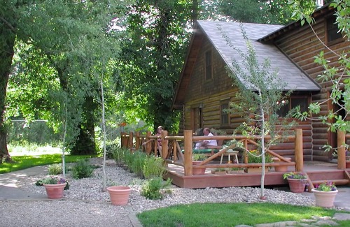 Ennis Cabin | Main House – Restored Historic Log Cabin, known as the Ennis Homestead