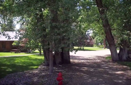 Ennis Cabin | Main House – Restored Historic Log Cabin, known as the Ennis Homestead