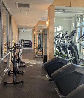 Mount Pleasant Apartment | Main Street Condo with Gym and Patio near Restaurants for 4