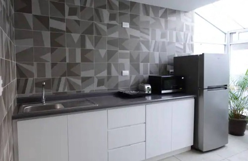 La Paz Apartment | Maison Lapinou - CUARTO NARANJA