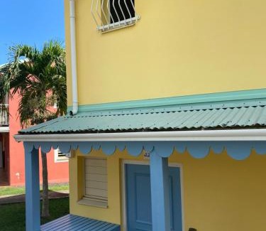 Pointe de la verdure Apartment | Maison mitoyenne , piscine,Citerne, jardin, parking, plage