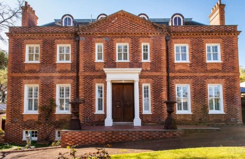 Bicton House | Make you holiday dreams come true at this well located, one of a kind property!