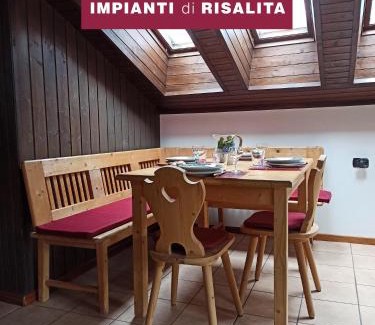 Alba Apartment | MANSARDA MARMOLADA sui campi da sci