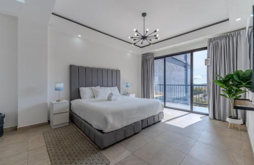 San Salvador Apartment | Margo 306- Luxe, Elegant & Cozy Condo- City Center