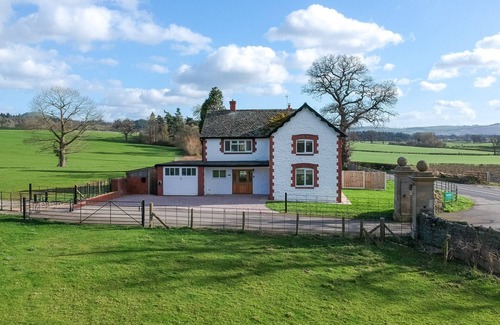 Chirbury with Brompton Cottage | Marrington Lodge, located through the ancient stone pillars at the entrance of the Marrington Estate