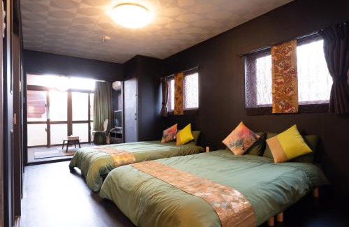 Maejima House | Maximum of 21 people can be rented in one building 3 minutes walk to Tomari Port 10 minutes drive to the airport No parking lot 30 seconds walk from paid parking lot warayunso port city May
