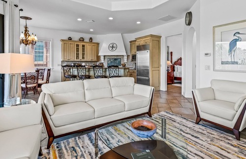 St. Tropez House | Mediterranean-style home with pool & hot tub access, W/D, AC & golf cart