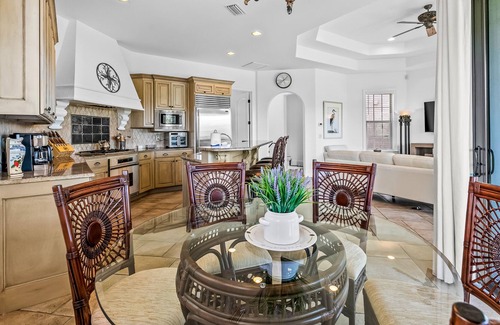 St. Tropez House | Mediterranean-style home with pool & hot tub access, W/D, AC & golf cart