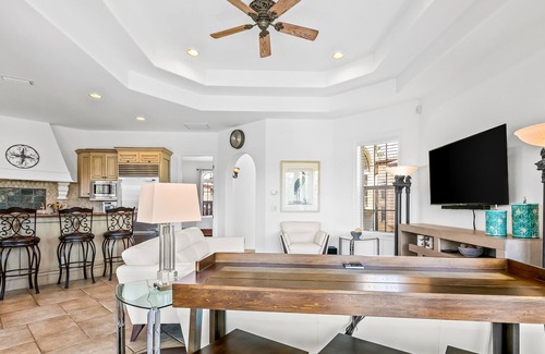 St. Tropez House | Mediterranean-style home with pool & hot tub access, W/D, AC & golf cart