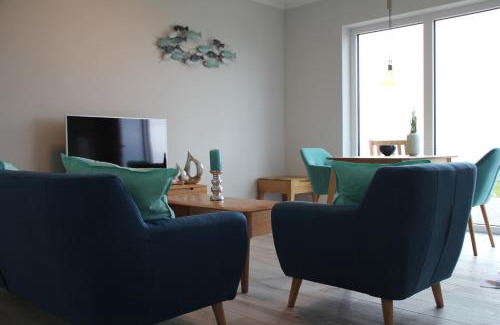 Fehmarnsund Apartment | Meerblick Fehmarnsund 1 - direkt am Strand