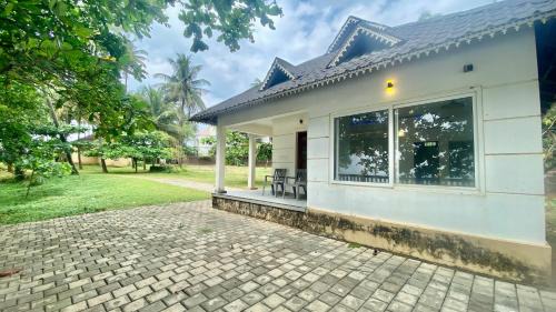 Kannur House | Metro Landsend Beach house