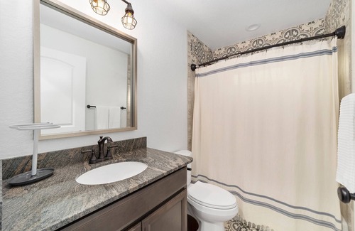Candler House | Mexican themed LARGE home walking distance to private lake! Fish swim and play!!