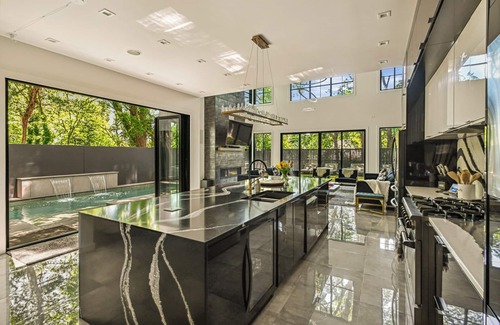 Westside House | Midtown Modern Showpiece - Pool - Pets - Rooftop