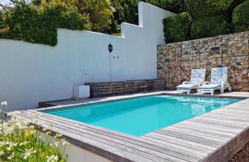 Gordons Bay Central House | Milkwood Cottage, Beachfront family vacation home, Sleeps 6
