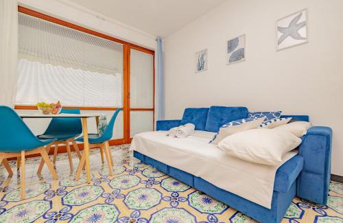 Capo Mimosa-Rollo Apartment | Mimosa Blu con vista mare terrazza - Wi Fi - AC - Parcheggio