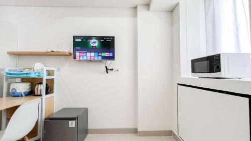 Makassar Apartment | Minimalist Studio (No Kitchen) at Bandaraya - Tallasa City Makassar Apartment By Travelio