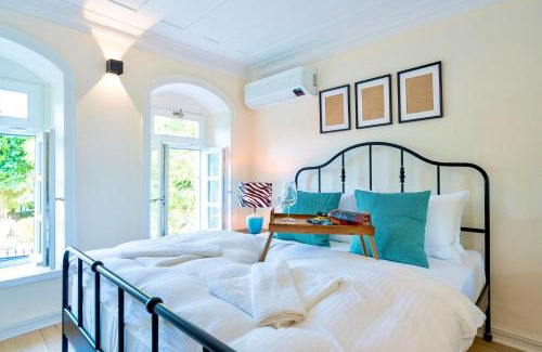 Foca House | MINIQ HOMES 102 - Historical Stone House with Garden Cinema