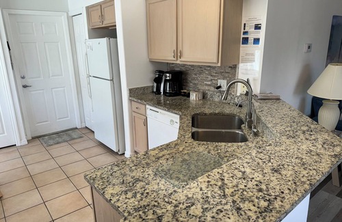 Esprit House | Minutes to Disney. House with pool on Golf Course with Lake Access