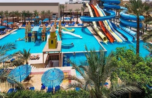 Village Road Ski Chalet | Mirage Aqua Resort 2 Bedroom Apartment