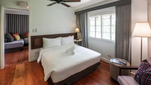 Bagong Lipunan Ng Crame Apartment | MiraNamin Nest LIRYO Suite in Unique Historic Home - Garden Access, Family Friendly, Shared Kitchen