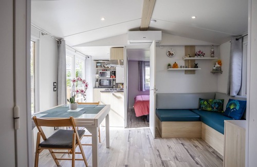 Carnac RV Rental | Mobile Home 'Au Petit Bonheur' with Shared Pool, Private Terrace and Private Garden