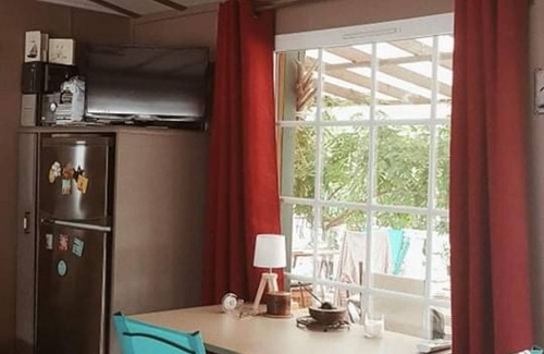 Claouey RV Rental | Mobile Home 'Le Bungalow Du Bassin' with Shared Pool, Private Terrace and Air Conditioning
