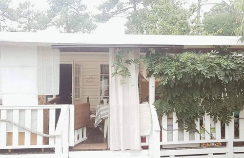 Claouey RV Rental | Mobile Home 'Le Bungalow Du Bassin' with Shared Pool, Private Terrace and Air Conditioning