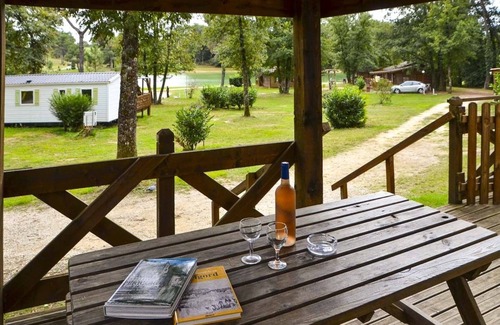 Douville House | Mobile home near a fishing pond