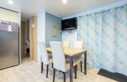 Pont-Aven RV Rental | Mobile Home 'Tout Confort Bora Bora' with Shared Pool, Private Terrace and Private Garden