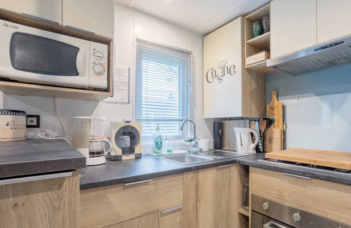 Pont-Aven RV Rental | Mobile Home 'Tout Confort Bora Bora' with Shared Pool, Private Terrace and Private Garden
