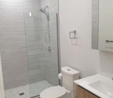West Bay Apartment | Modern 1 bedroom walking distance to the beach!