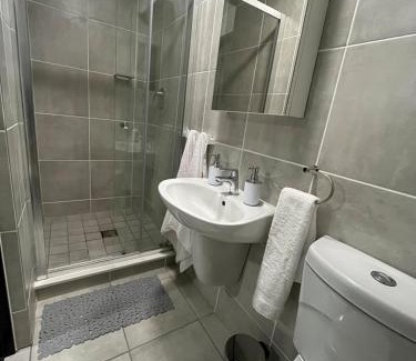 Boksburg Apartment | Modern 1BR Near OR Tambo, Wi-Fi, Secure Parking