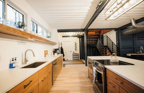 Sarona House | Modern 4-bedroom container home on Long Lake!