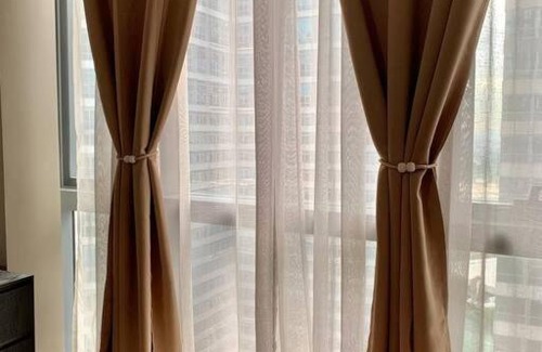 Bagumbayan Apartment | Modern Aesthetic Staycation Unit