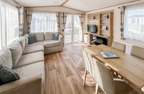 Bleadon House | Modern and contemporary 12ft-wide caravan with two twin.