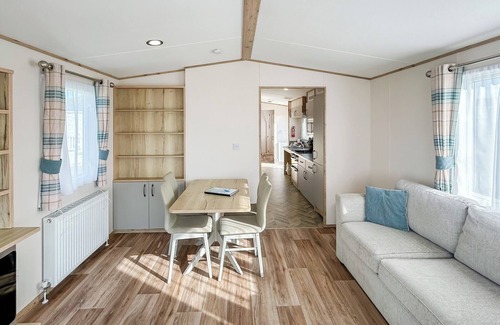 Bleadon House | Modern and contemporary 12ft-wide caravan with two twin.