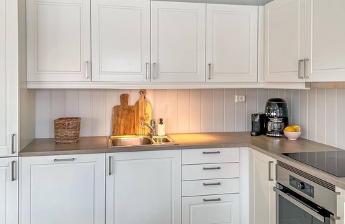 Risor House | Modern and comfortable cottage with very spacious wooden terrace.