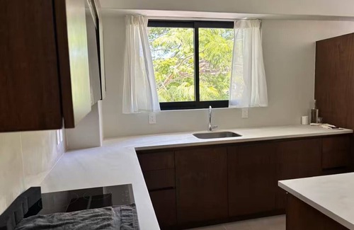 P Chahue Apartment | Modern Apt with Pool - 5 Min walk to Chahue Beach