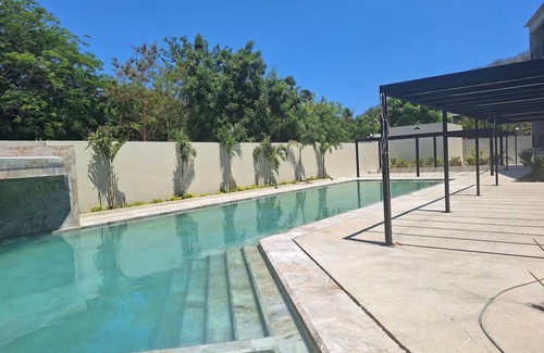 P Chahue Apartment | Modern Apt with Pool - 5 Min walk to Chahue Beach