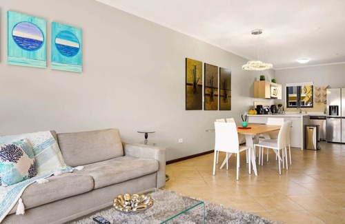 Gold Coast House | Modern Aruba Home with Pools and Gym