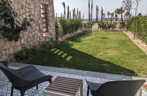 Soma Bay Ski Chalet | Modern Beachfront 1BR Loft with Garden in Somabay
