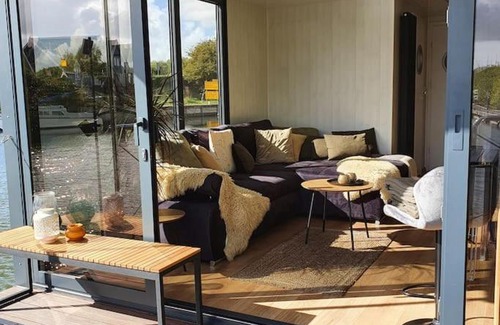 Monnickendam Boat Rental | Modern, brand new houseboat near Amsterdam