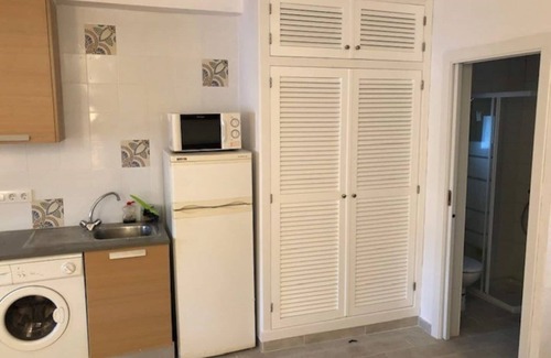 Binisafua Apartment | Modern Bungalow "Binisafua Playa - Bungalow 14" Near the Beach with Shared Outdoor Pool, A/C, Wi-Fi, Terrace & Garden; Parking Available