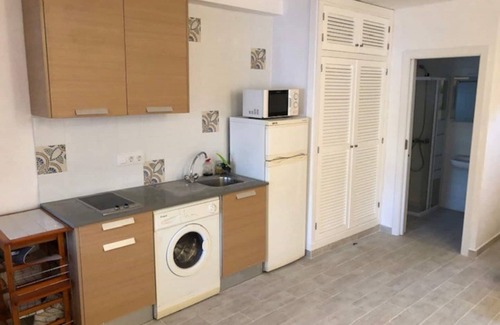 Binisafua Apartment | Modern Bungalow "Binisafua Playa - Bungalow 14" Near the Beach with Shared Outdoor Pool, A/C, Wi-Fi, Terrace & Garden; Parking Available
