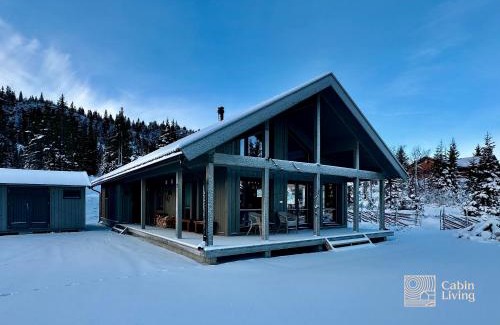 Svingvoll House | Modern cabin Skeikampen with ski-in out cross country trails & great view