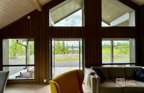 Svingvoll House | Modern cabin Skeikampen with ski-in out cross country trails & great view
