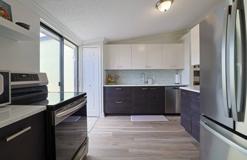 New Smyrna Beach Villa | Modern Coastal 2 bed 2 bath villa, pet friendly, 2 miles from beach