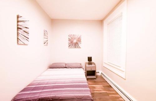 The Heights Apartment | Modern comfort-2BR haven mins to NYC