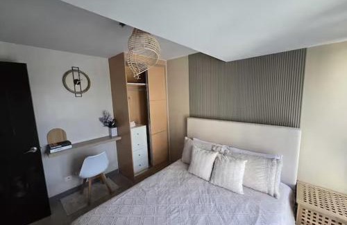 Bagumbayan Apartment | Modern Comfort & Snap Worthy with Pool, Gym & More